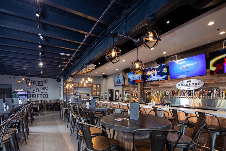 Queen Creek native Jesse Herfel and his wife, Karen, have been real estate agents for over 25 years in the East Valley and decided to branch out recently to become new bar owners in Gilbert, opening The Brass Tap in December 2022.