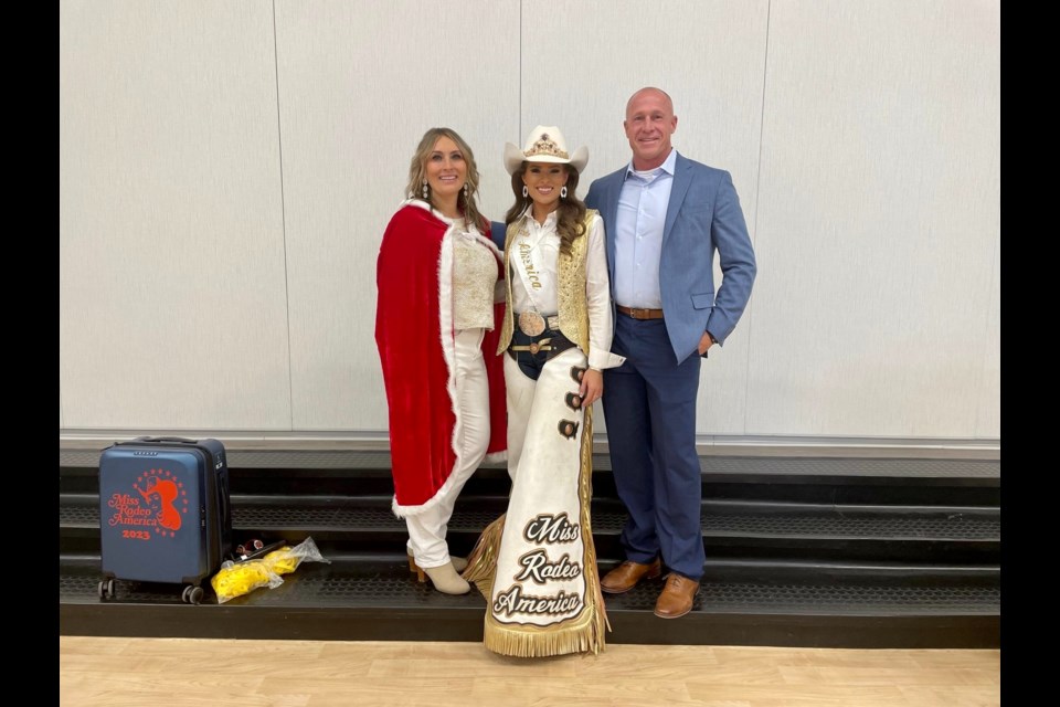 Dr. Perry Berry, Queen Creek Unified School District superintendent, celebrated holiday spirit days across the district before break with Queen Creek High alum Kennadee Riggs, Miss Rodeo America 2023.
