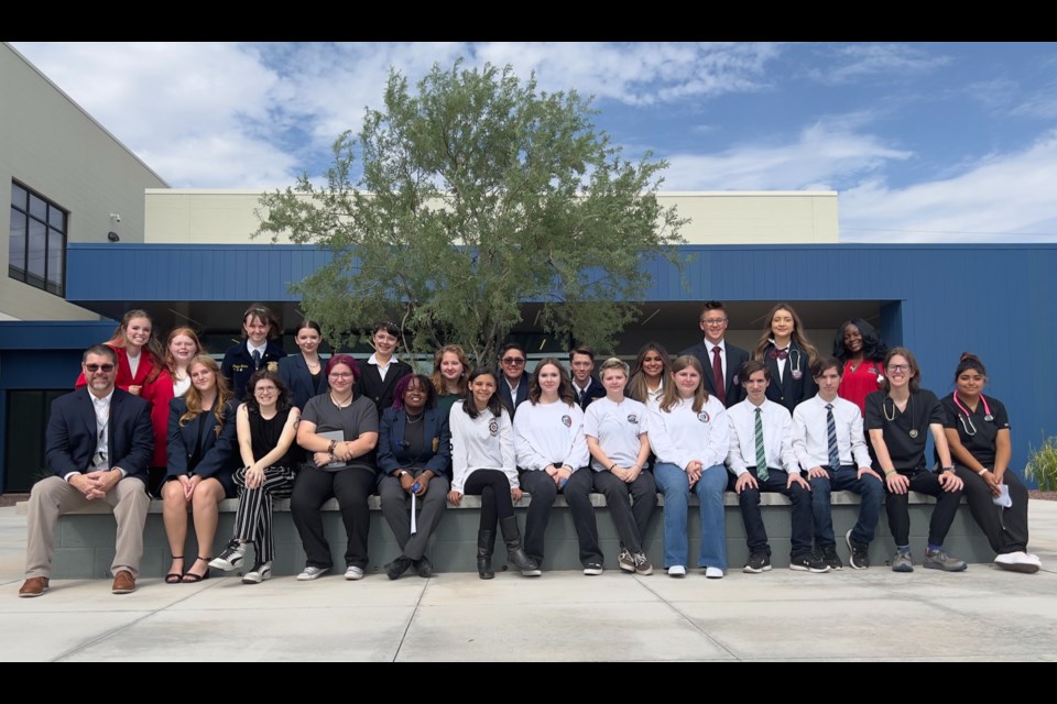 J.O. Combs Unified School District Career and Technical Education students recently attended the Combs Education Foundation Business Breakfast, along with John Scrogham, the district's coordinator of CTE.