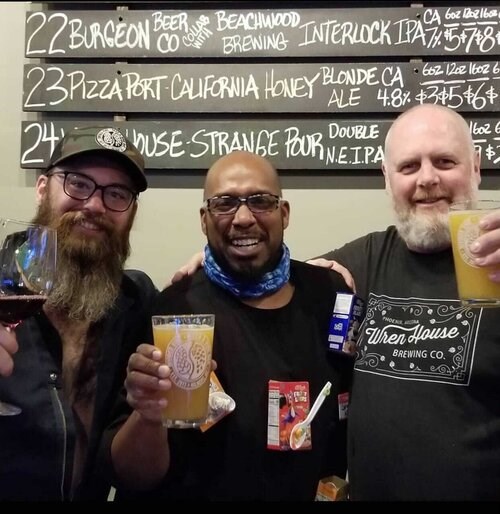 Owners Clayton Steffen and Jeff Attaway want all patrons to be happy with their imbibing experience so options at Divided Vine Beer and Wine Bar are split right down the middle. Pictured from left are Steffen, General Manager Rico Smith and Attaway.
