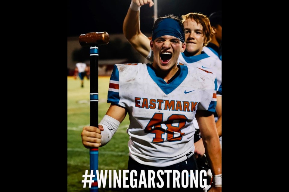 The Eastmark High School varsity football team is rallying behind their teammate, Kevin Winegar, as he battles leukemia after the team's championship win this year.