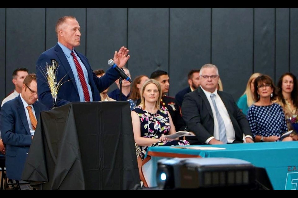 Superintendent Dr. Perry Berry speaks to family and friends who came out last week to celebrate the Class of 2022 at a senior awards ceremony at Eastmark High School. This year's graduation will be the first for Eastmark High with its first senior class, which includes over 130 students.