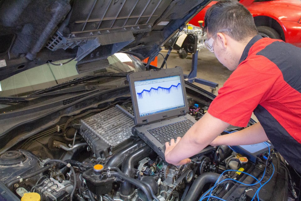 Trouble-shooting engine problems is one of the skills students learn in the Automotive Technologies program at the East Valley Institute of Technology in Mesa.