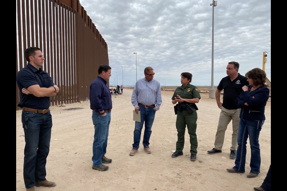 Gov. Doug Ducey speaks to Border Patrol at the Yuma border on Dec. 9, 2021.