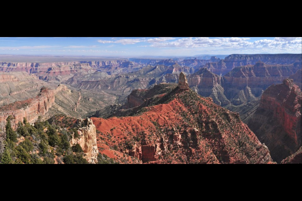 Point Imperial, the highest point on the North Rim at 8,803 feet (2,683 meters), overlooks the Painted Desert and the eastern end of Grand Canyon. Here the canyon transforms as the narrow walls of Marble Canyon, visible only as a winding gash, open dramatically to become "grand." Layers of red and black Precambrian rocks, not visible at Bright Angel Point, add contrast and color. Part of the viewpoint is accessible.