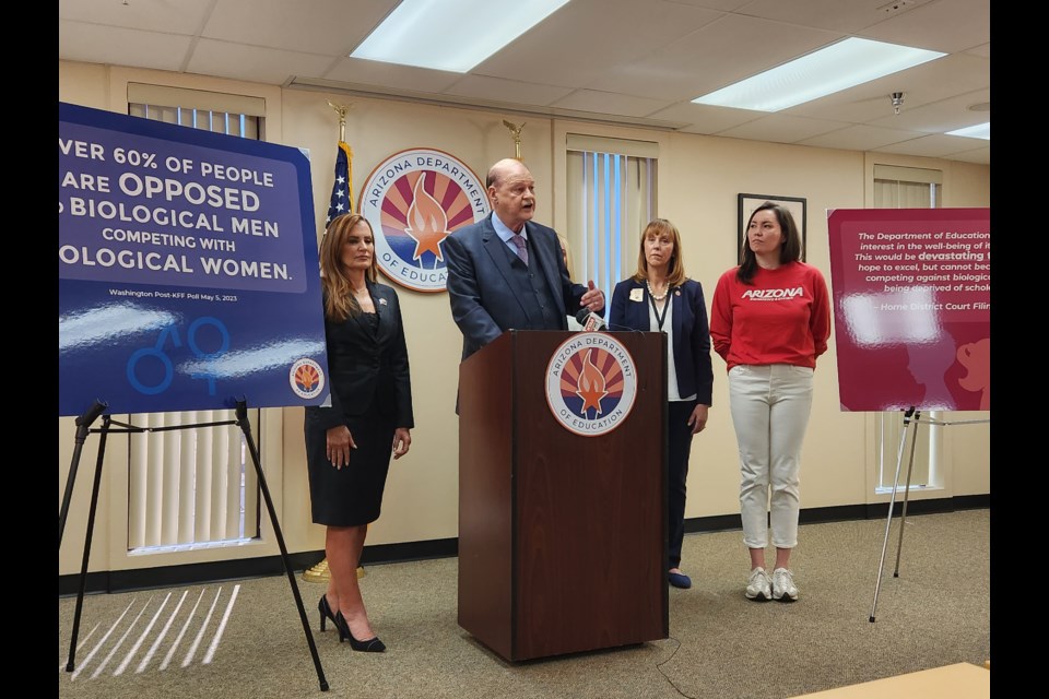 In a news conference this morning to explain the filing, State Superintendent of Public Instruction Tom Horne was joined by Marshi Smith, the 2005 NCAA and Pac-10 Conference Women’s backstroke champion who competed at the University of Arizona and is in the school’s athletic Hall of Fame.