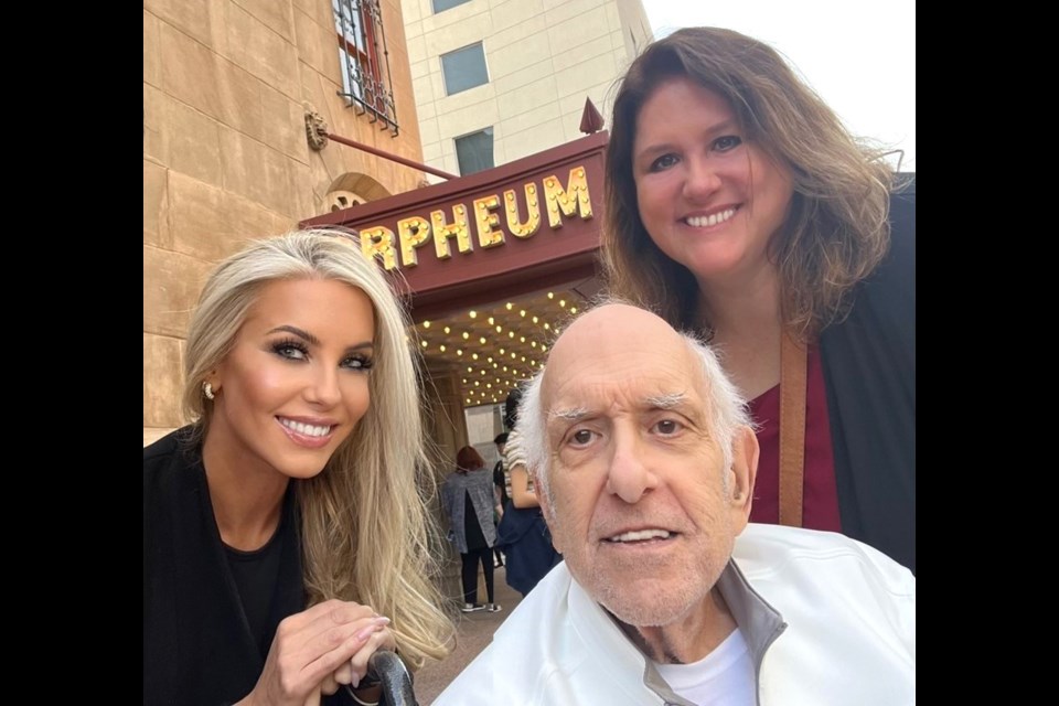 Stuart Brown’s daughters, Melissa and Heather Brown, accompany him to a recent concert at the Orpheum Theatre.