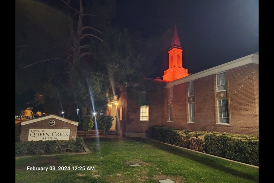 Queen Creek's Town Hall lit up in orange to honor the life of Preston Lord.