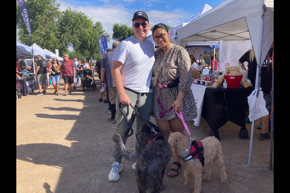 Nathan and Kuresa Scott with their two dogs at the Oct. 8, 2022 Queen Creek Family Market.