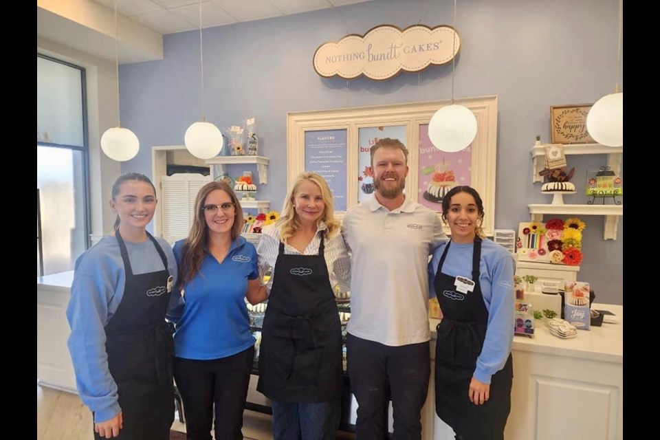 Nothing Bundt Cakes opened its doors Sept. 11, 2023, ready to "Bring the Joy" to Queen Creek. Pictured from left: Maddie Kahl, guest service "Joy Giver;" Maegan Guseman, manager; Jan Newton, owner; Shawn Strunk, owner; Kianna Gonzalez, guest service "Joy Giver."