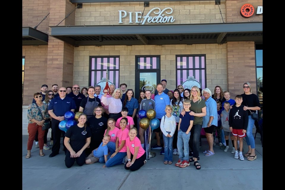 Area business owners joined the Queen Creek Chamber of Commerce, Queen Creek Vice Mayor Jeff Brown and Queen Creek Councilmember Travis Padilla in welcoming PIEfection owner Cheryl Standage and family at a Nov. 10, 2023 ribbon cutting ceremony.