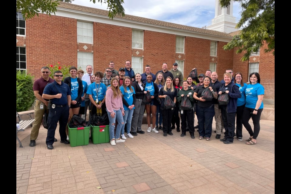 Queen Creek Unified School District students recently welcomed the town's new police officers to the community with welcome bags as part of their service project for the district-wide Lead Out Loud club.