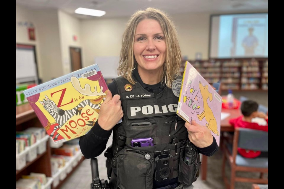 Officer Rachel de la Torre had a great time helping kids at Auxier Elementary School pick out a good book to read on Read Across America Day and Dr. Seuss' birthday, March 2, 2023.