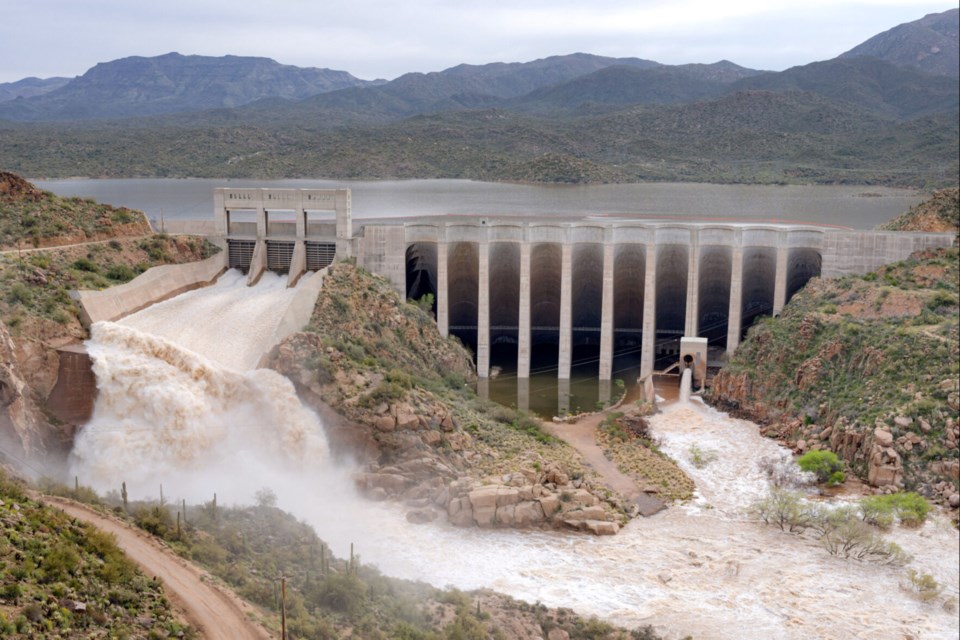 Water rushing out in a release from the Verde River at Bartlett Dam.