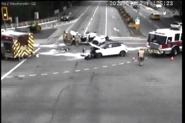 These city traffic camera photos show the aftermath of the crash at No. 2 Road and Westminster Highway in Richmond