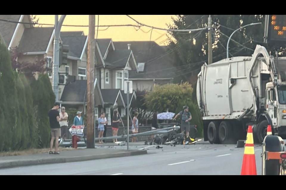 An accident involving a truck and a street lamp has an area of No. 1 Road blocked off in Richmond.