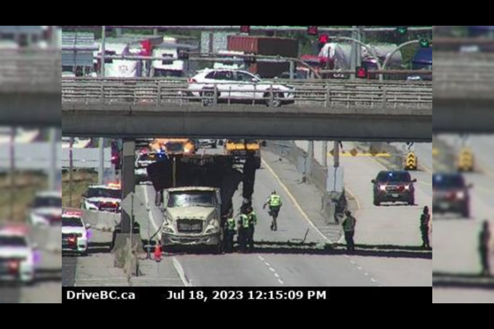 Traffic at the Massey Tunnel is heavily congested after a truck smashed into the Highway 17A overpass on Tuesday morning.