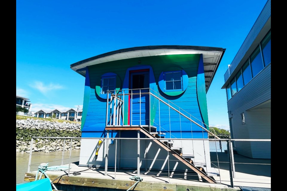 Blue cabin from outside. 