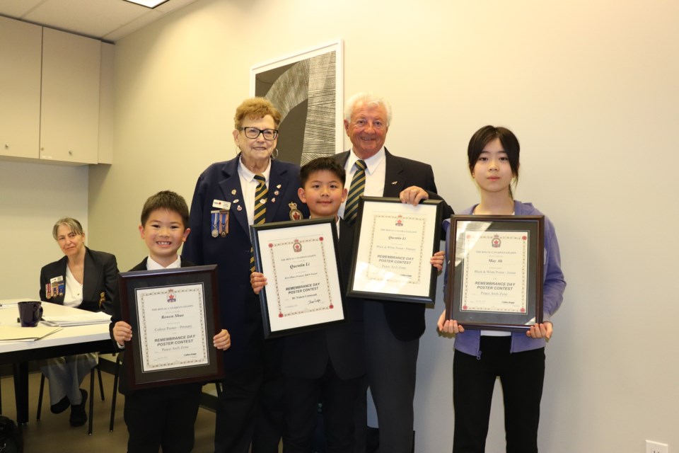 From left to right: Richmond youth Bowen Shao, Quentin Li and May An with members of The Legion.