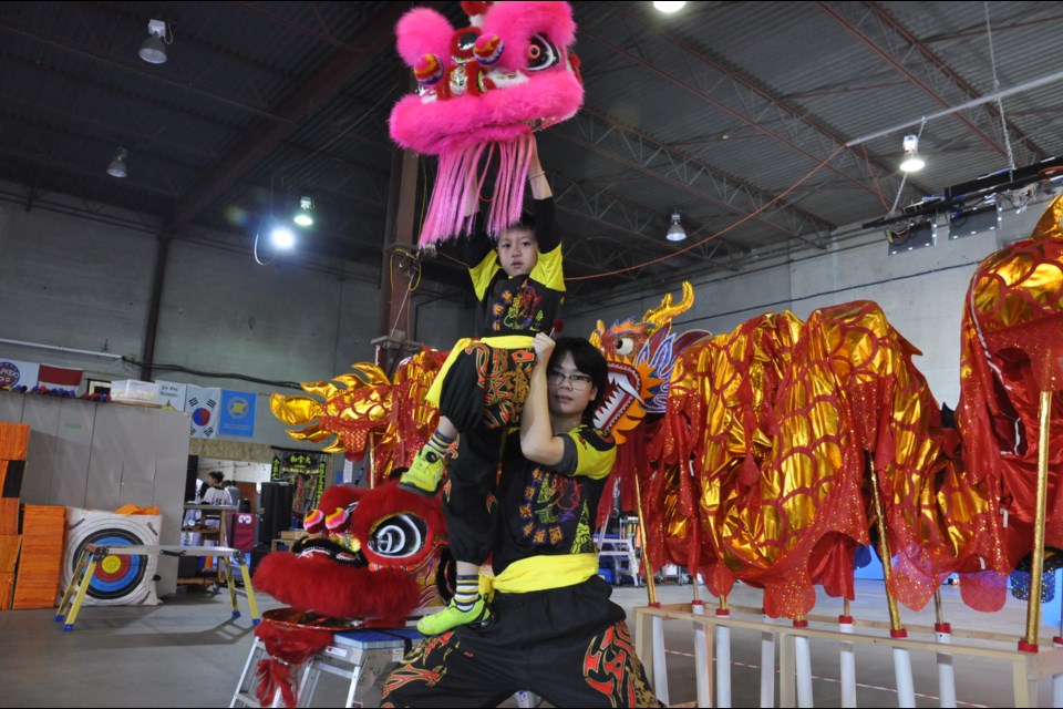 Ryle, 7, and Darren Yip, 15, are part of the Richmond-based Vancouver Chinese Lion and Dragon Dance Team.  