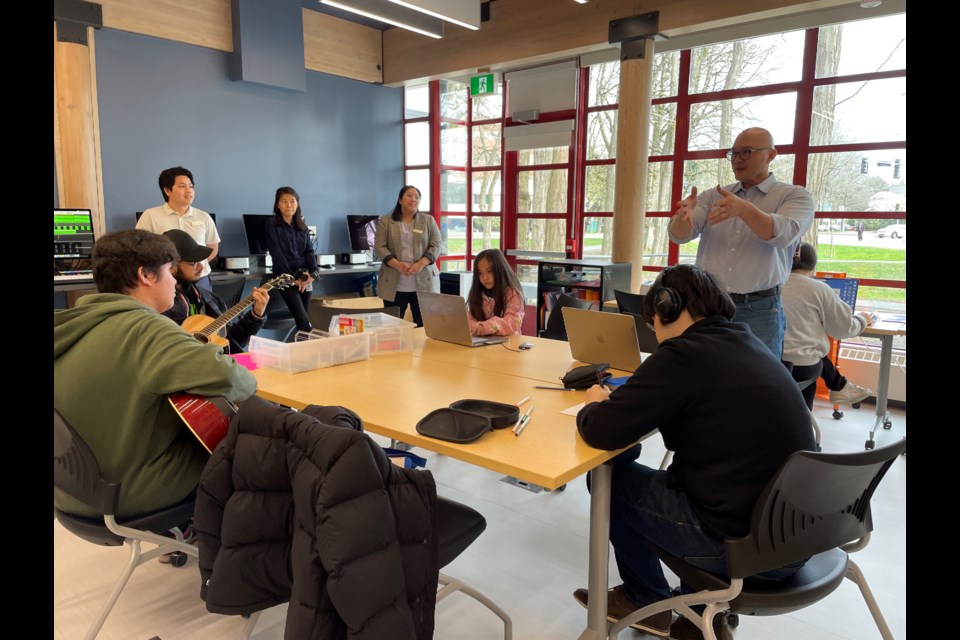 MLA Richmond South Centre Henry Yao (right) at the new Richmond Cultural Annex Centre media lab.