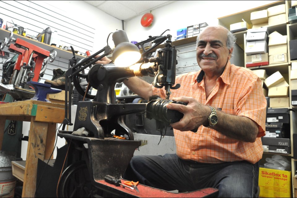 Ali Akhlaghi, a refugee from Iran, has run his shoe repair shop at Garden City Shopping Centre since 1991.