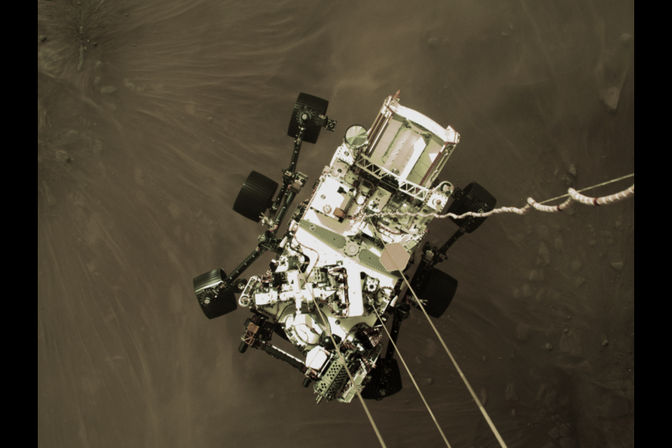 NASA's Perseverance rover pictured as it descends to Mars. Six compact cameras, designed by Richmond company FLIR Systems, captured the entry, descent and landing of the rover.