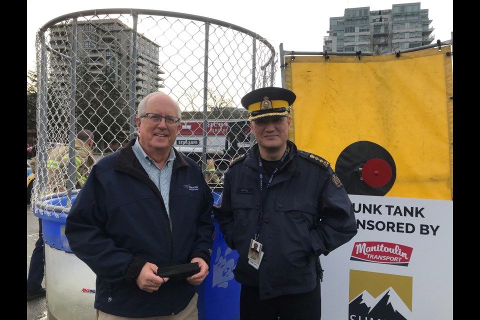 Richmond Mayor Malcolm Brodie and Richmond RCMP Chief Supt. Will Ng at the toy drive.