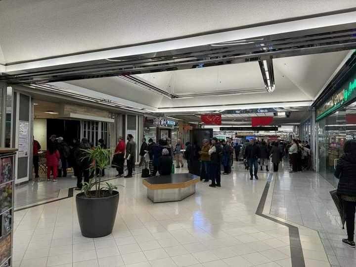 Line-up on the first day of Richmond Christmas Fund registration and distribution at Lansdowne Centre.