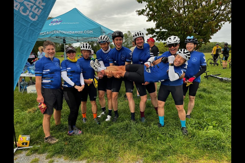 Richmond resident Edmond Chan (middle) formed a team of cyclists to ride for charity.