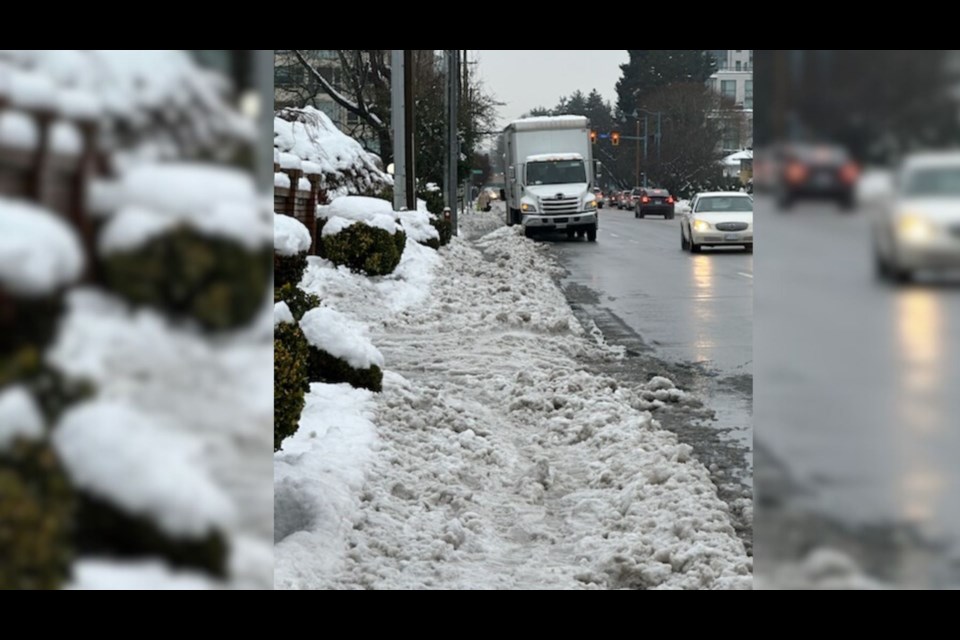 The sidewalk on Cooney Road after the snow plows went through.