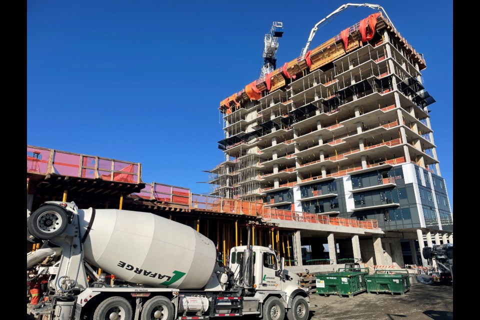 The first tower out of 12 is going up at the south end of Richmond Centre.