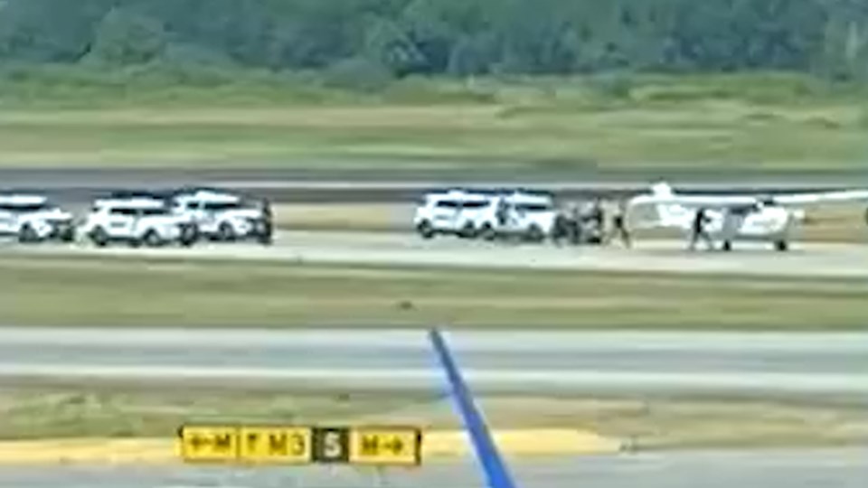 Police vehicles were seen at YVR Tuesday afternoon, surrounding an aircraft.Dean Sexton