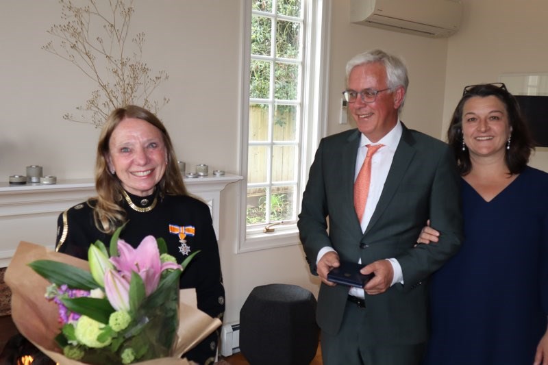 Richmond's Adriana Zylmans (left) receives her award from Dutch Consul-General to Vancovuer Henk Snoeken