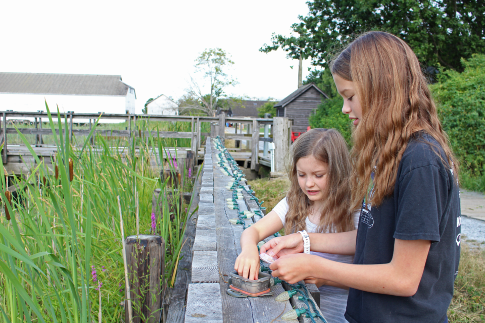 Lyndsey and Carys Glen showed The Richmond News one of their favourite caches located at the Britannia Shipyards, without giving away its location of course.