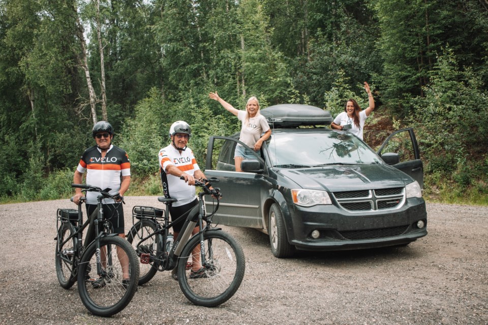 Bob Fletcher posing with his riding companion Wayne Grover and support team Kim Voogsgeerd and Yiota Georgakopoulou.