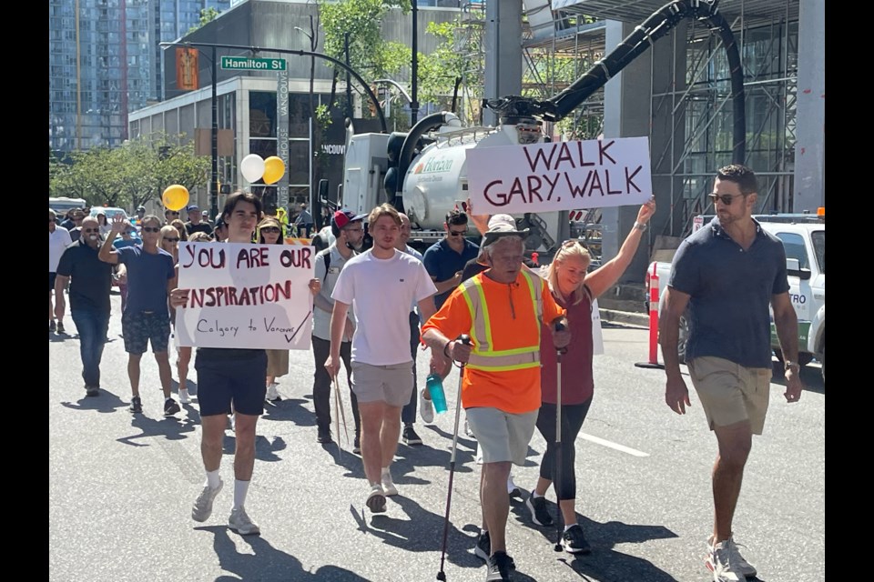 Supportive friends, family, and fans walked with Gary Averbach as he completed his trek from Calgary to Vancouver to raise funds and awareness for cancer research.