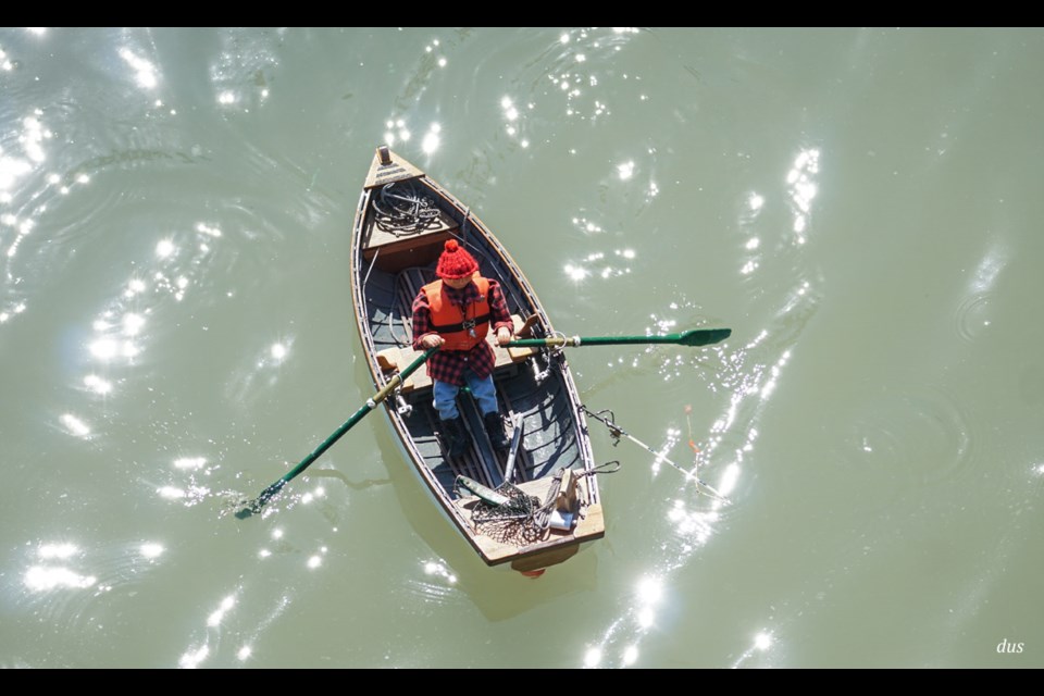 A mini fisherman and canoe were controlled remotely in Steveston during the Maritime Festival.