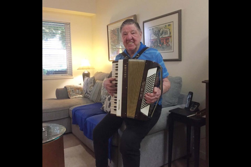 Johnny Forrest straps on his accordion one more time
