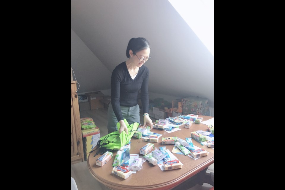 Amy Hung was giving out packages to children at the Poland-Ukraine border. 