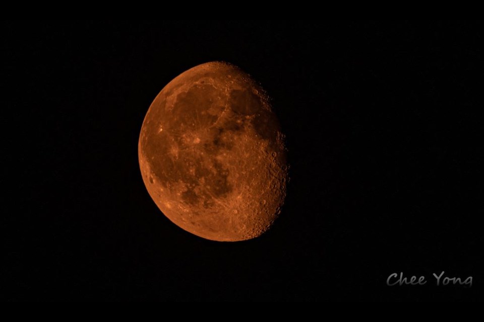 The wildfire smoke made the moon look red on Tuesday night.