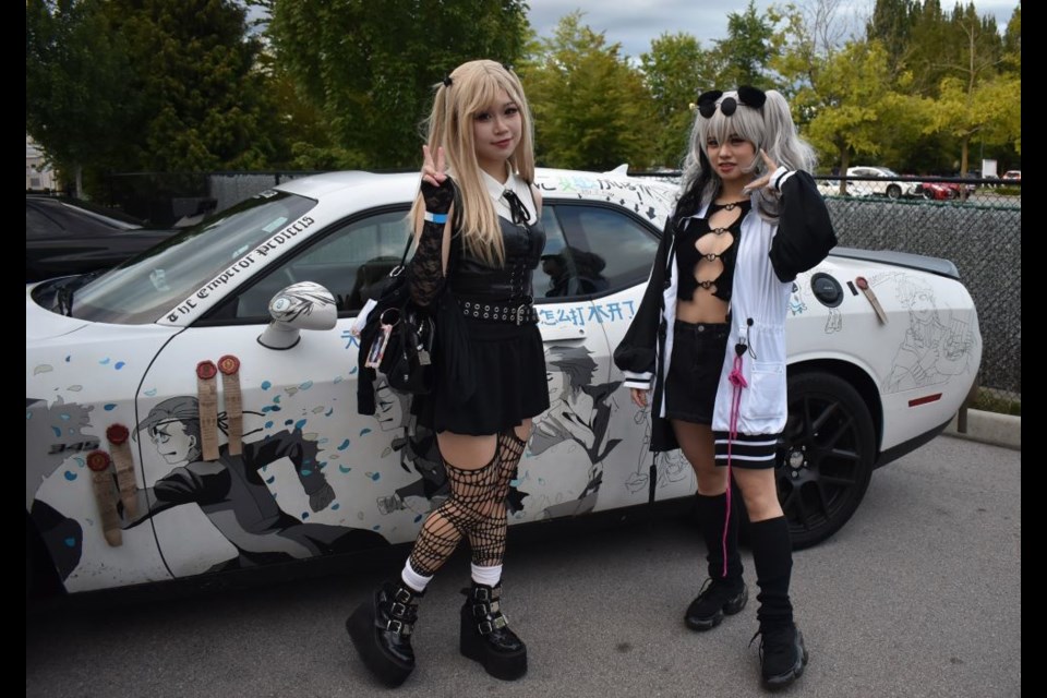 Cosplayers dressed as FEater from Arknights (left) and Misa Amane from Death Note were at Cars and Cosplay in east Richmond on Saturday.
