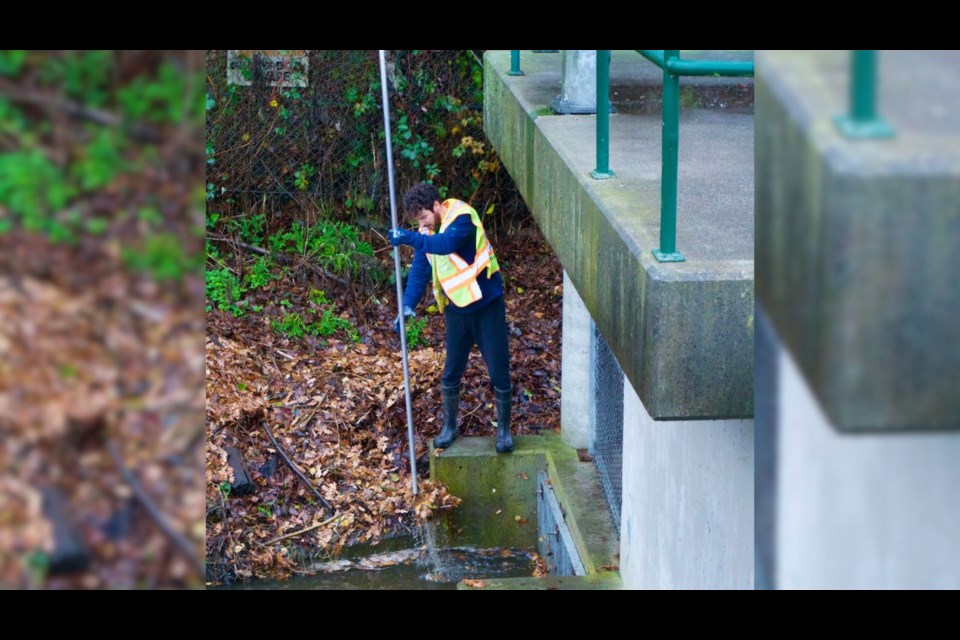 Richmond city workers clean debris from the ditches to keep water flowing and stop the city from flooding.