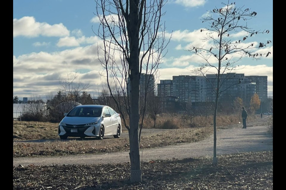 A Richmond driver found a parking spot in the middle of a walking trail on Garden City Lands.
