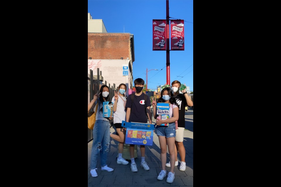 From left to right: Gogivers Foundation members Ivy Qin, Jasmine Ren, Tony Guo, Juliet Kwok and Matthew Li donated 60 care packages to those in need in July.