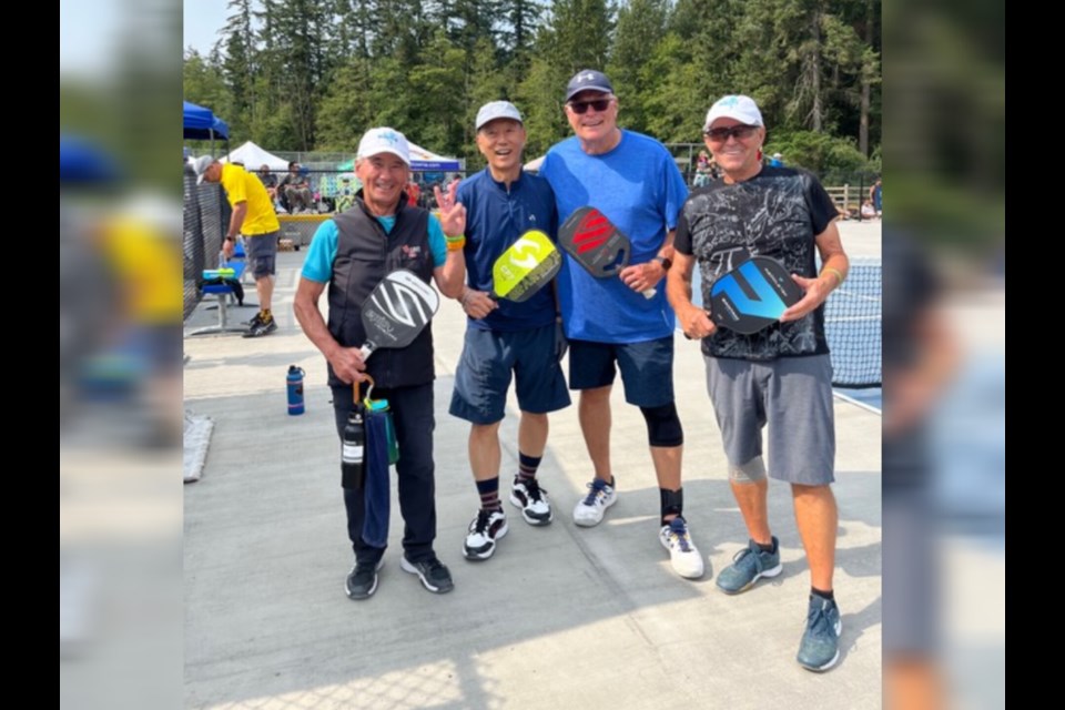 John Yagi (first from left), a 73-year-old Richmond BC Pickleball Association member, and his partner James Min (second from left) won silver at the Super Senior Slam Pickleball Tournament in Surrey. Photo submitted 