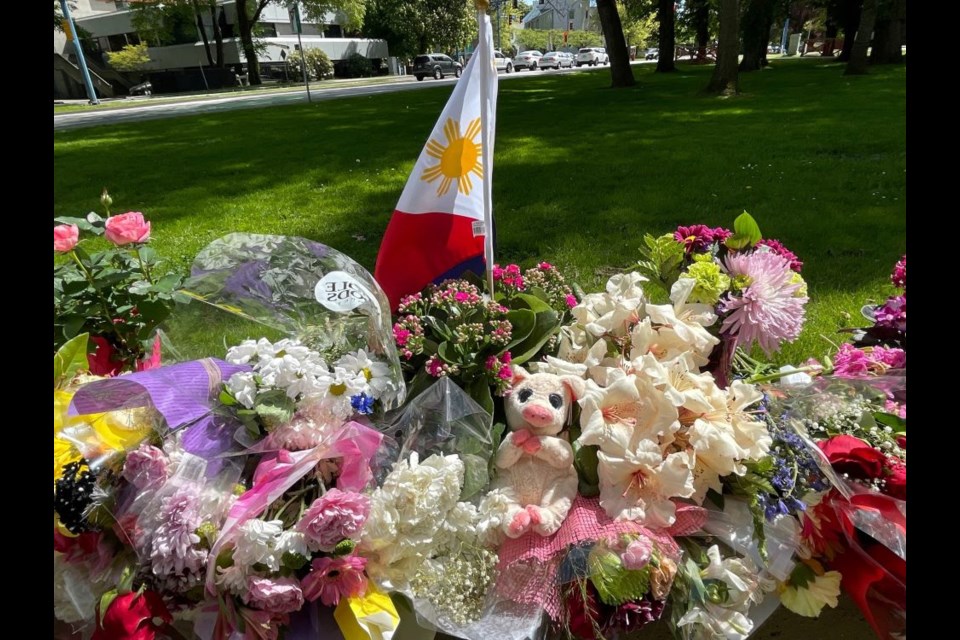Flowers, words of condolence, stuffies and candles were at the Richmond memorial to the Lapu Lapu Day festival victims.