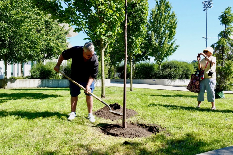 Community members gathered outside the Minoru Centre for Active Living for a tree planting ceremony in memory of Linda Yale, who was Richmond's oldest resident.