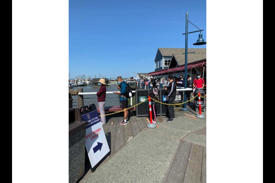 A massive line has formed in Steveston for the first day of spot prawn sales.