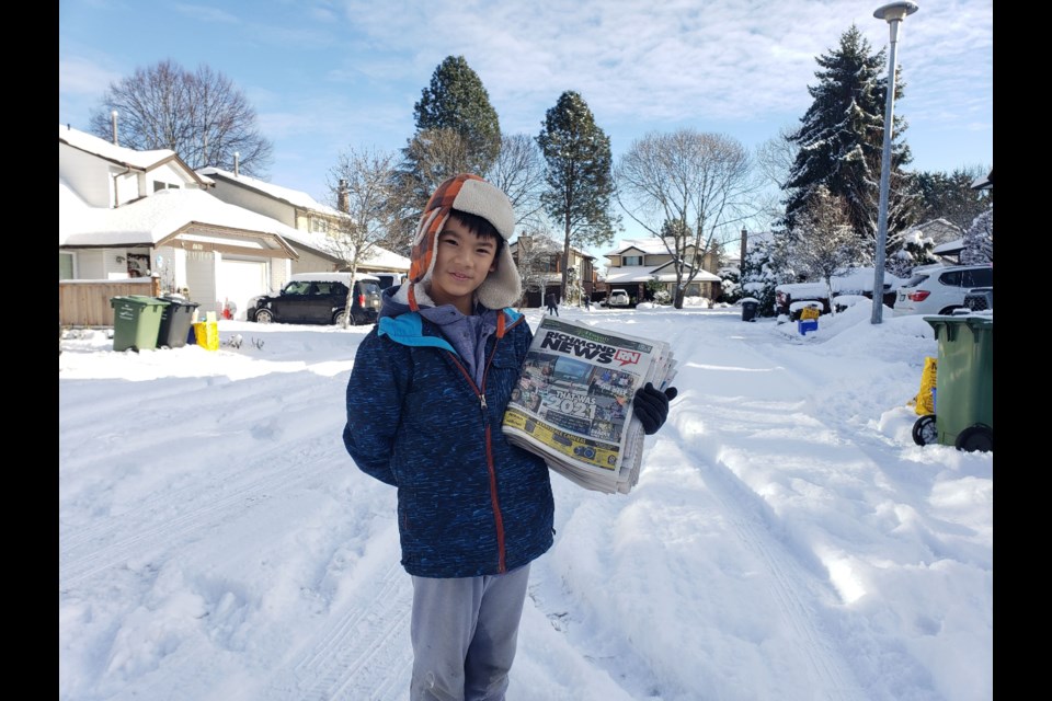 Yves Hu learned to deliver papers in any type of weather.